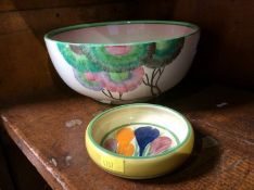 A Clarice Cliff 'Rhodanthe' pattern bowl and a small Crocus dish