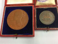 Two Commemorative tokens