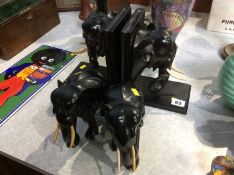 A pair of ebony elephant bookends and a pair of standing elephants (4)