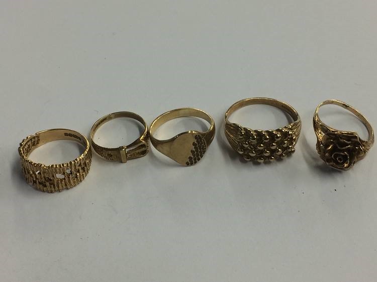 Five 9ct gold rings, weight 14.4 gms