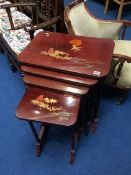 An Oriental lacquered quartetto of tables