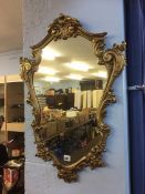 Gilt framed mirror Size 74cm x 53cm.