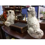 A tall pair of Victorian Staffordshire Spaniels and a leather bound bible