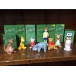 A set of eight Beswick 'Winnie The Pooh' figures, boxed