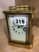 A brass carriage clock