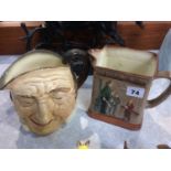 Royal Doulton 'Oliver Asks For More' water jug and a Character jug 'Farmer John'