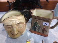 Royal Doulton 'Oliver Asks For More' water jug and a Character jug 'Farmer John'