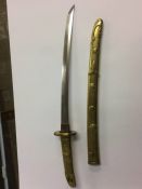 Small Oriental sword in brass scabbard