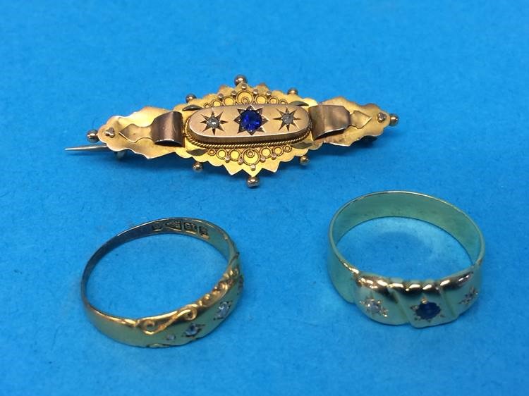 An 18ct gold and diamond ring, weight 2.9gram, another ring and a 9ct brooch mounted with