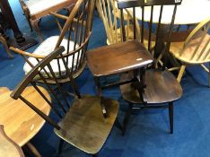 Two Ercol chairs and a small Ercol table