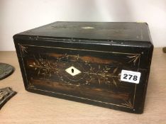 A Victorian sewing case with fitted interior