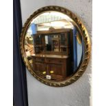 Circular gilt mirror