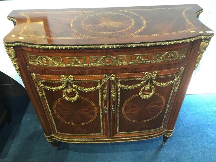 A Louis XV style two door side cabinet, with single drawer, 114cm wide