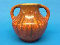 A Royal Lancastrian two handled vase, with drizzled orange lustre decoration, numbered 3181, 19cm