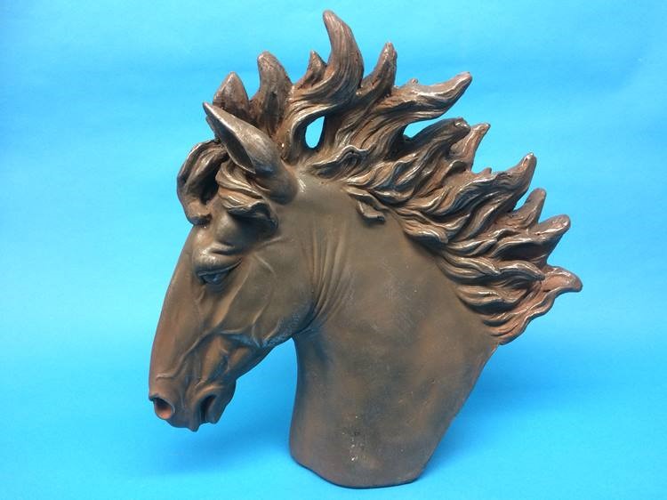 A bust of a Stallions head