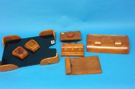 An Art Deco 'Carvacraft' butterscotch Bakelite 7 piece desk set comprising of double inkwell,