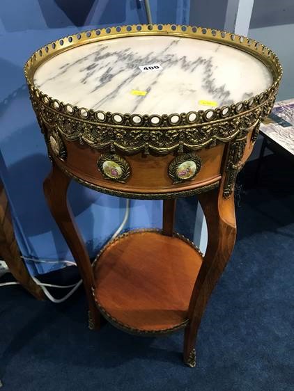 A Louis XV style inset circular marble top two tier occasional table, 34cm diameter