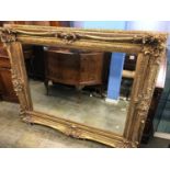 A large gilt mirror, 157cm x 128cm