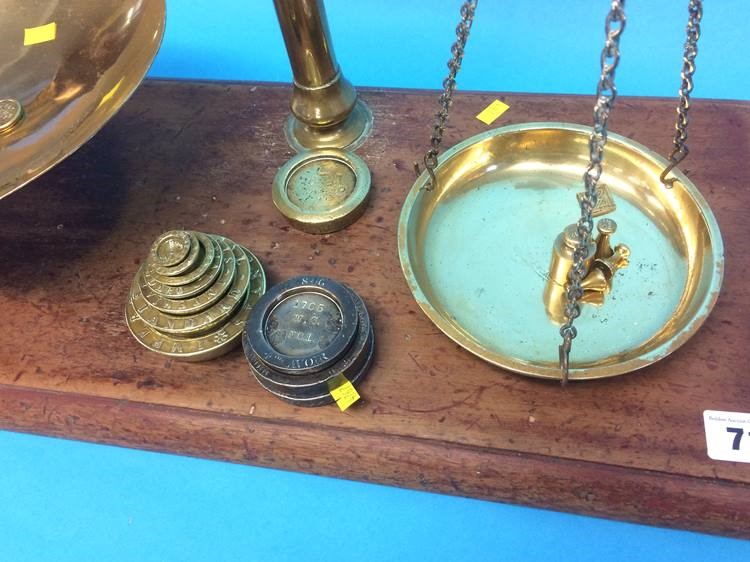 A set of brass weights and scales, G. and W. Pairman, Newcastle, a brass trivet and copper kettle - Image 3 of 5