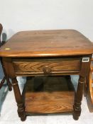 A small Ercol single drawer side table, 47cm wide