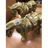 Two brass horses