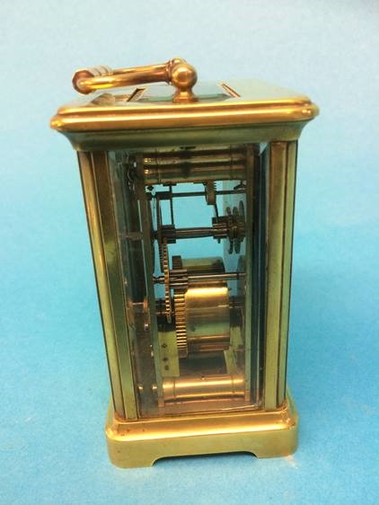 A brass carriage clock, with unsigned dial, the movement stamped 'Made in France' - Image 2 of 3