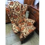 A Queen Anne style deep easy armchair