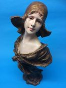 An Art Nouveau style bust of a lady, 60cm height