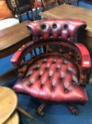 A leather Chesterfield button back office chair