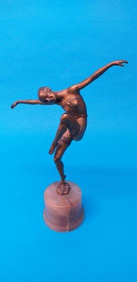 Two Art Deco spelter figures, one holding aloft an alabaster ball, the other with arms - Image 3 of 3