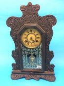 A ginger bread clock, an oak mantel clock etc.