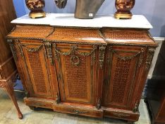 A decorative Louis XV style marble top three door side cabinet with parquetry decoration and gilt
