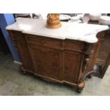 A decorative Louis XV style marble top breakfront side cabinet, with single drawer and panelled