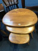 An Ercol nest of Pebble tables