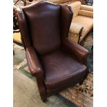 A brown leather armchair