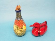 A Royal Doulton flambé duck and a Dennis Chinaworks vase and cover