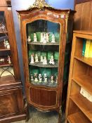 A Louis XV style bowfront Vitrine, with parquetry decoration and gilt metal mounts, 57cm wide