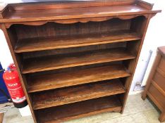 A mahogany open bookcase, 122cm wide and 132cm high