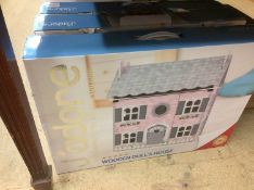 Three boxed wooden dolls houses