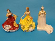 A Coalport figure 'HM Queen Elizabeth' and two Doulton ladies