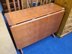 Drop leaf table and three chairs