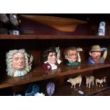 Four Royal Doulton Toby jugs