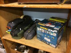 Assorted camping equipment and a spray gun