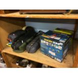 Assorted camping equipment and a spray gun