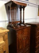 A Quartteto nest of tables and a reproduction mahogany cabinet