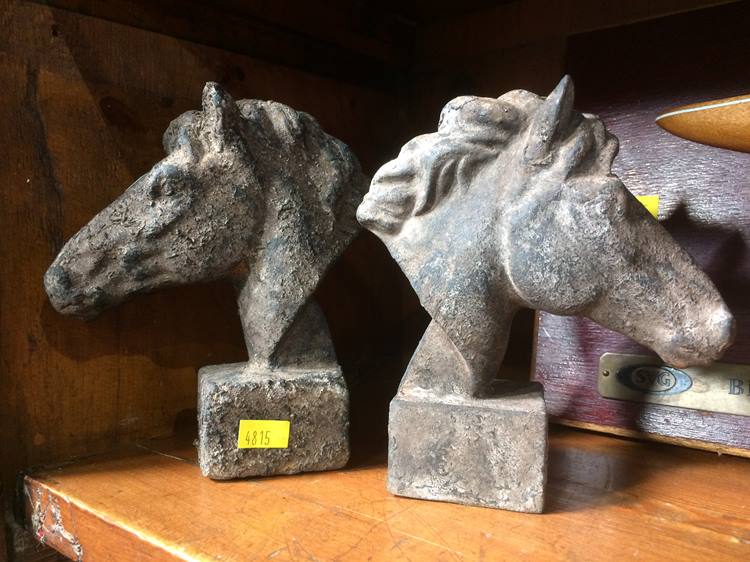 Pair of rough cast horse busts