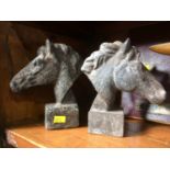 Pair of rough cast horse busts