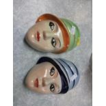 Two Crown Devon face plaques by Dorothy Ann