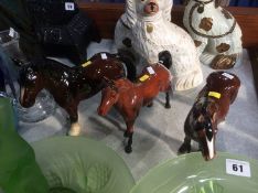 Two Beswick horses and one other