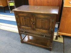 Two oak cabinets